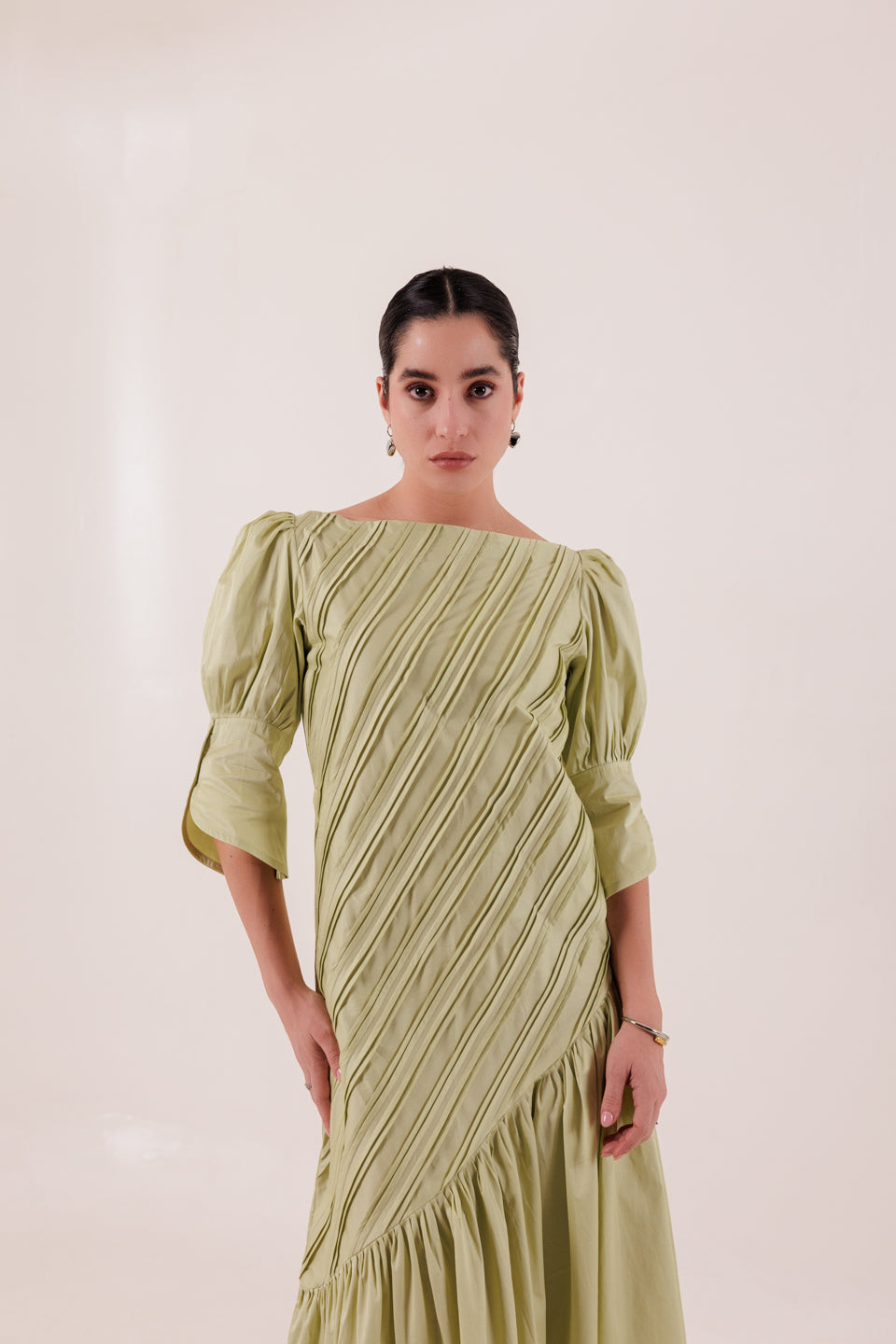 PISTACHIO GREEN DIAGONAL PLEATED MAXI DRESS