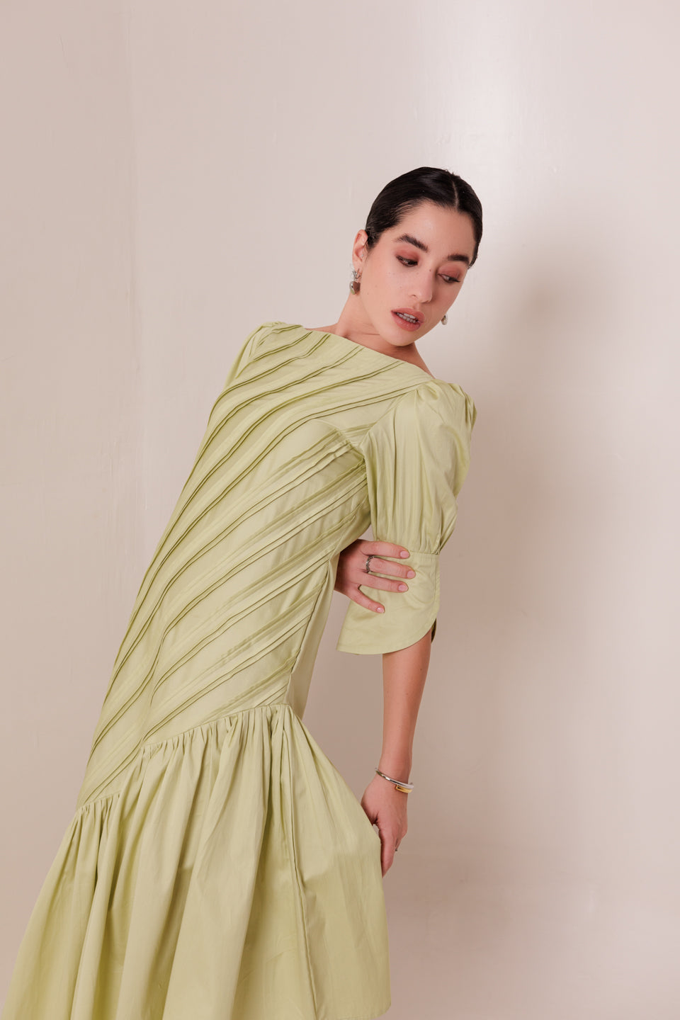 PISTACHIO GREEN DIAGONAL PLEATED MAXI DRESS